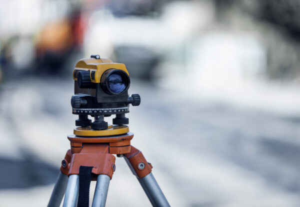 A selective focus shot of a survey work camera for construction
