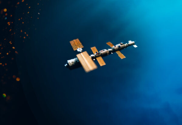 Space satellite orbiting the blue planet. Decorations for photo sattelite.